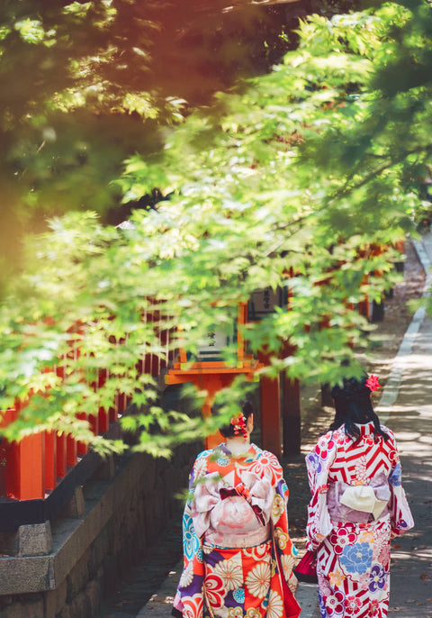 japanese girls in yukata during summer visiting temple